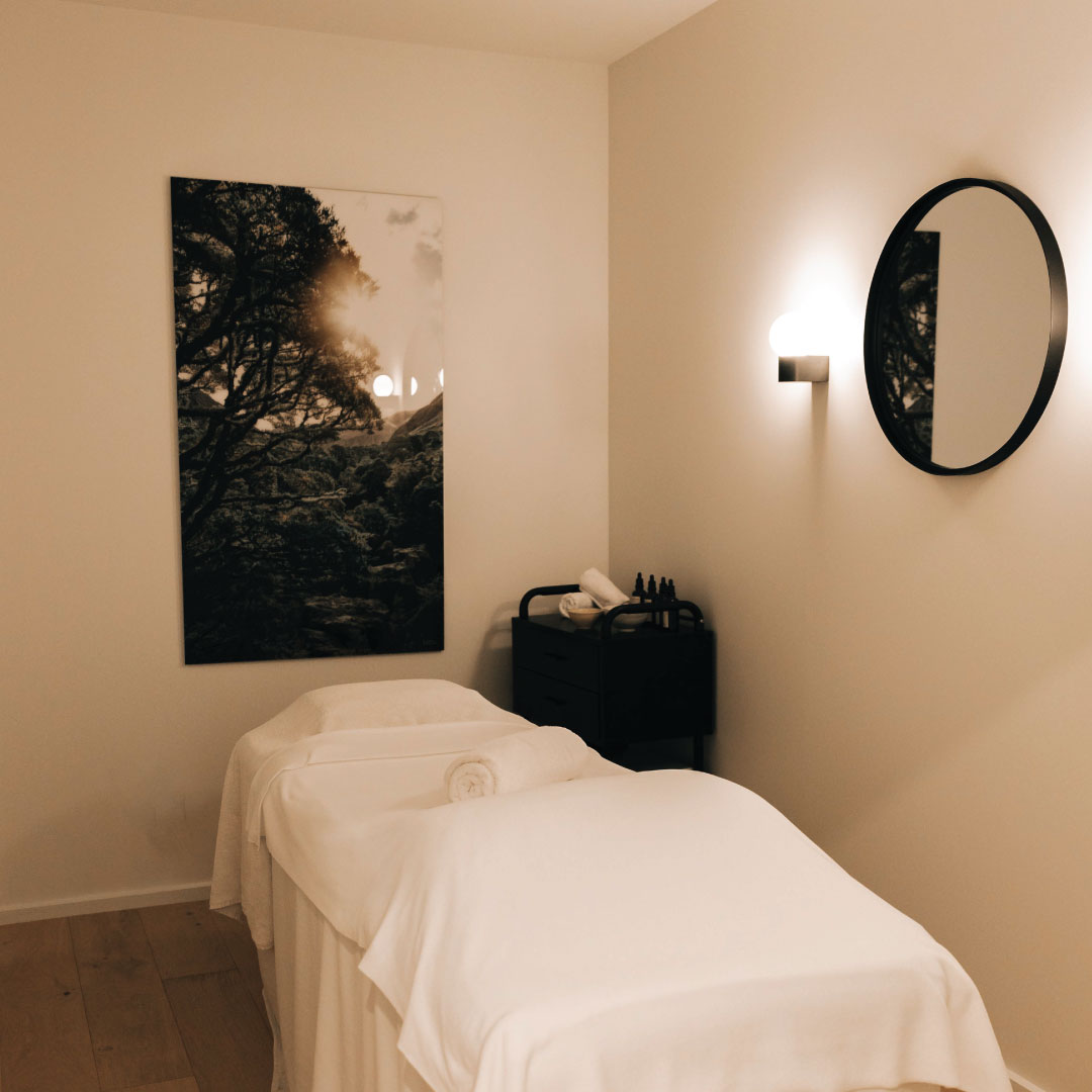 An intimate treatment room at The Well Spa